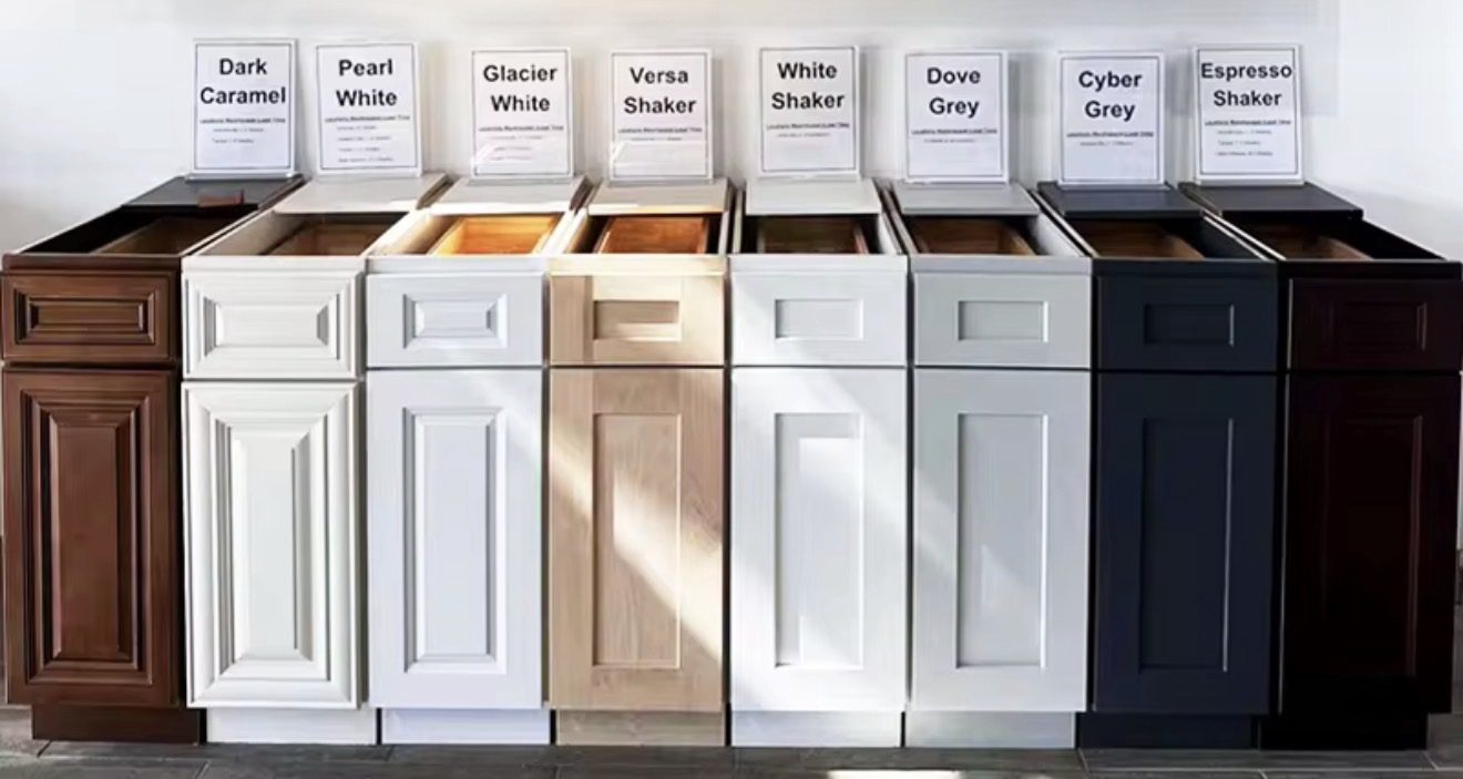 Eight labeled cabinet finish samples in our showroom