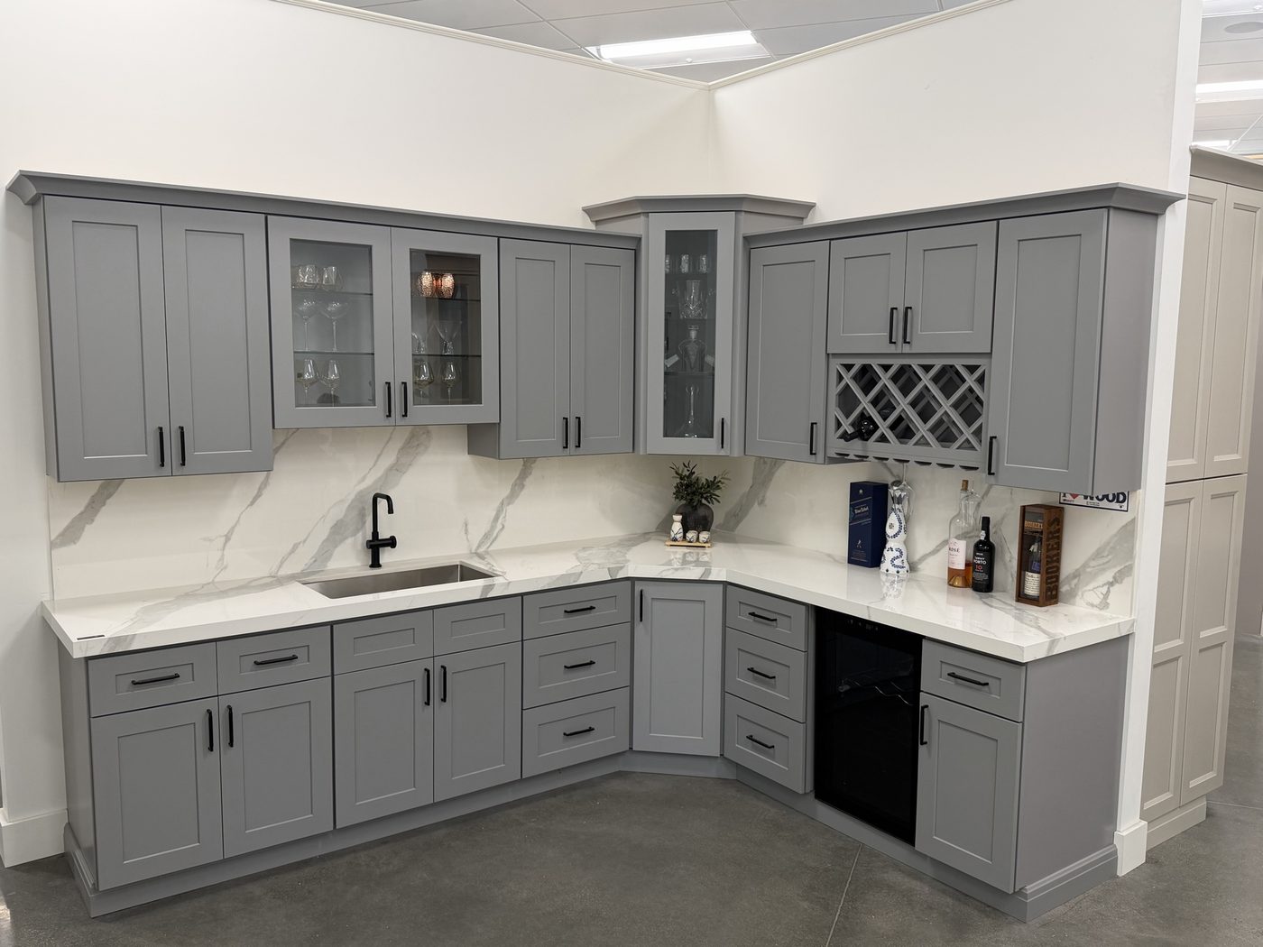 Grey shaker kitchen with built-in wine cooler