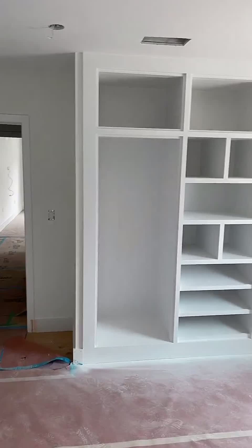 Custom built-in closet and shelving under construction