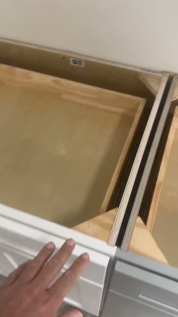 Close-up of cabinet drawer edge and construction detail