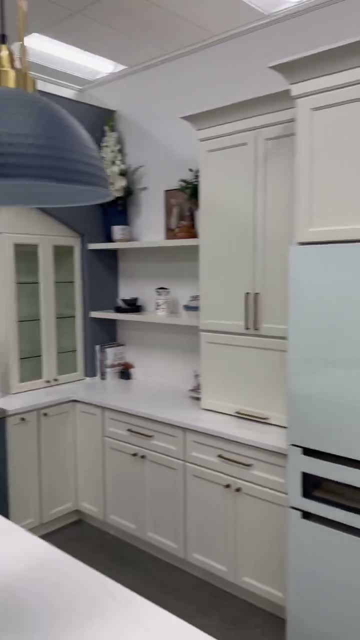Finished kitchen cabinet doors next to the refrigerator